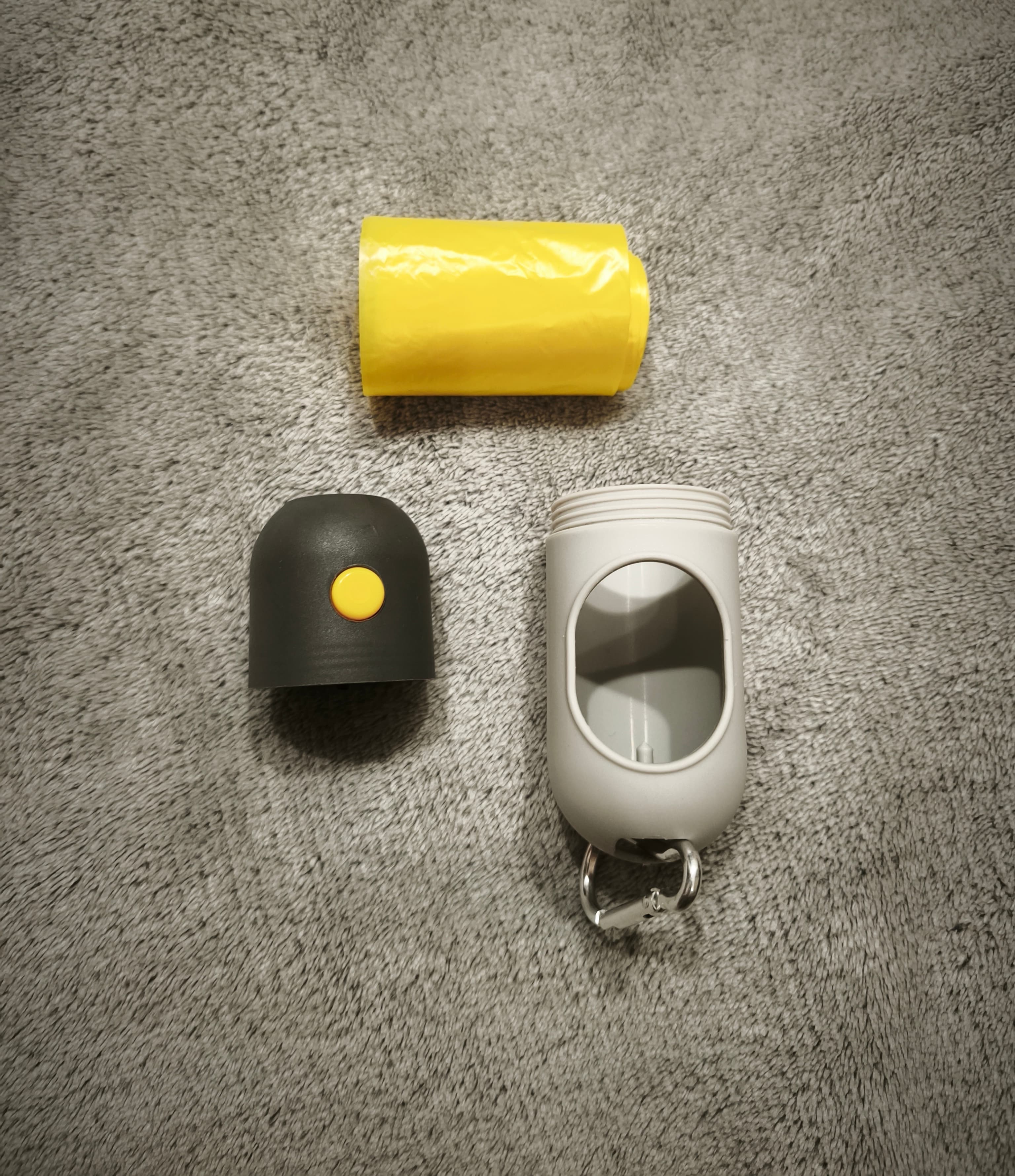 Przenośny dozownik biodegradowalnych woreczków z lampką LED 🐾